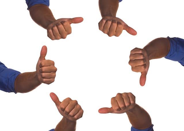 Thumbs up hands forming a circle.